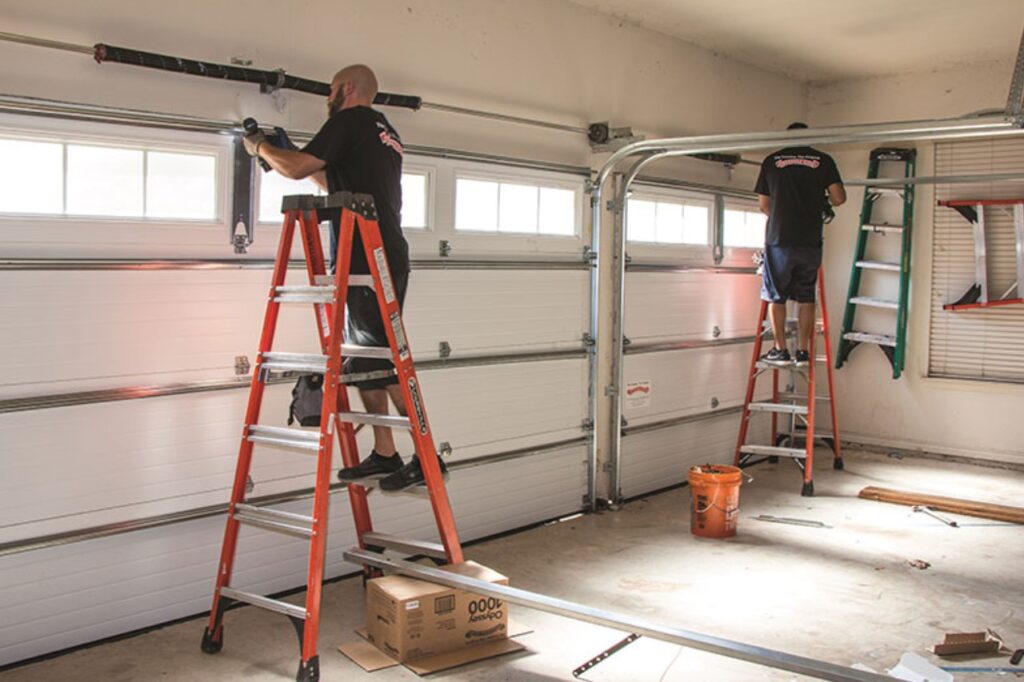 Garage door opener repair service image showing a specialist diagnosing a motorized opener system. This service includes fixing remote controls, sensors, motors, and electrical issues to restore reliable automatic operation. Our professional technicians ensure safe, quiet, and efficient garage door opening and closing for improved security and everyday convenience.
